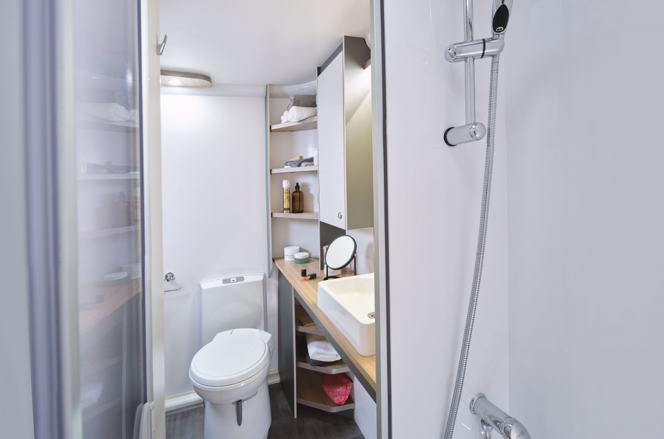 Discovery gloss white shower cubicle with riser bar
